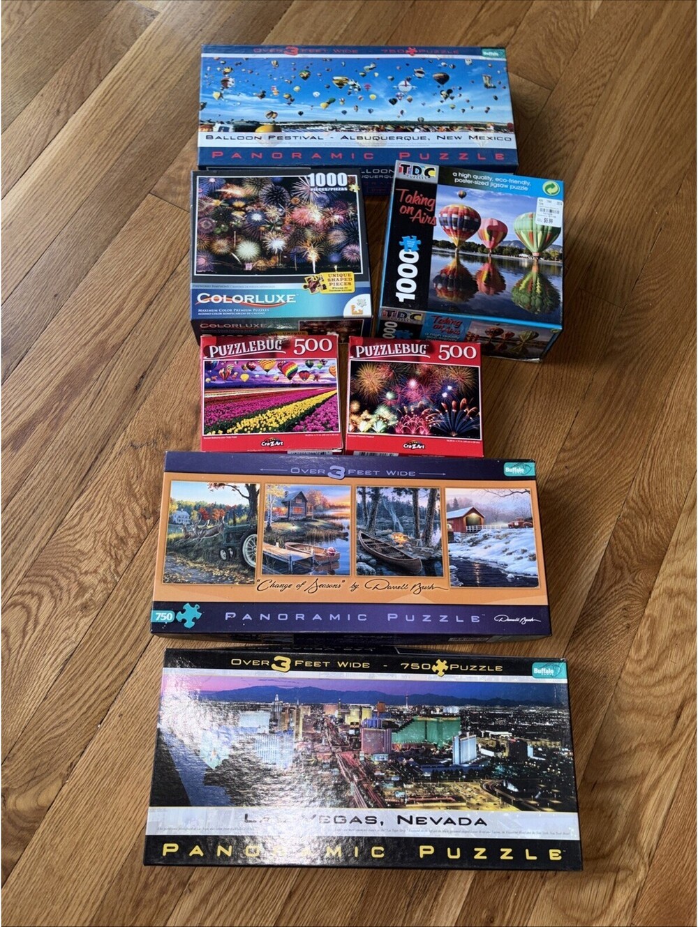 7 Puzzles 3 Hot Air Balloons, 2 Fireworks 1 Change Of Seasons, And 1 Las Vegas